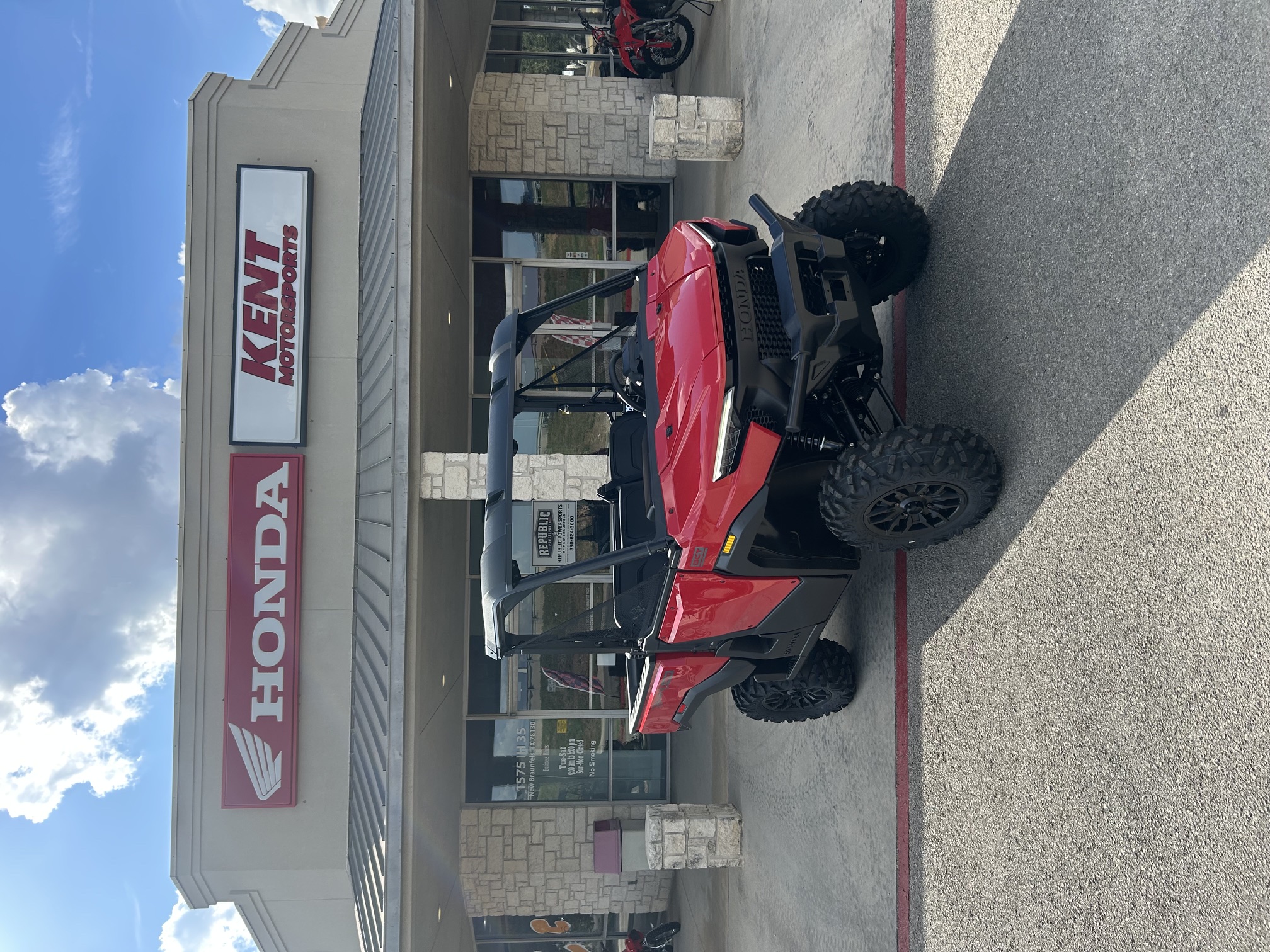 2026-HONDA-Pioneer-1000-Deluxe-Hero-Red-004826 - Republic Powersports - Braunfels